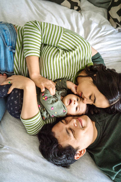 istock Toddler and her parents 1083939372