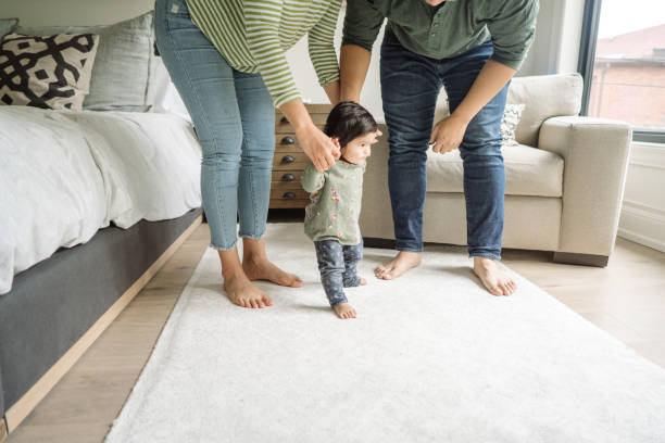 istock Toddler and her parents 1083939384