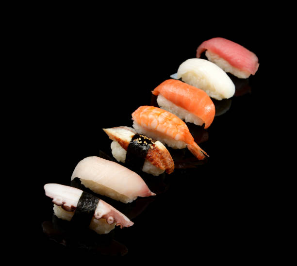 istock Japanese sashimi sushi set on black background 1083947216