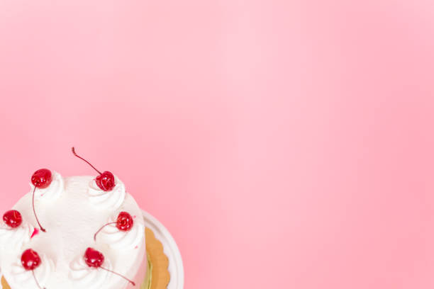 istock Birthday Spumoni cake on pink background. 1083947784