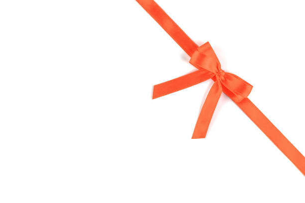 istock Shiny coral silk ribbon on white background. 1083950688
