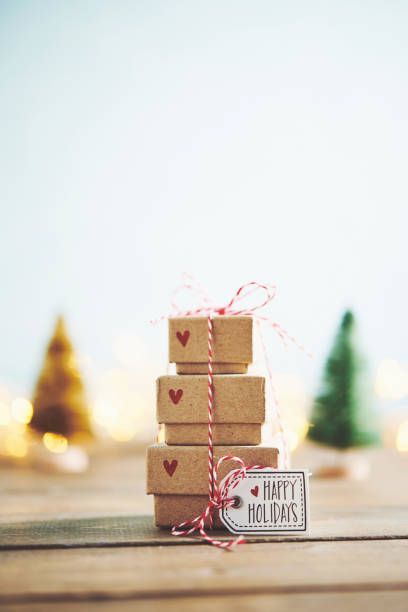 istock Cute gift stack with Christmas trees and Christmas lights 1083950804