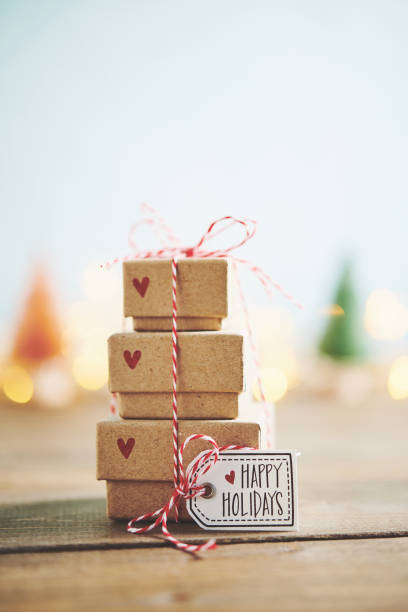 istock Cute gift stack with Christmas trees and Christmas lights 1083951878