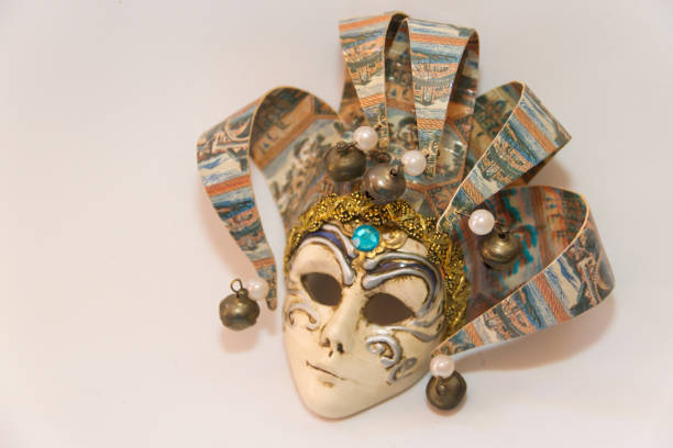 istock masks and feathers of venice carnival on white background 1083954908