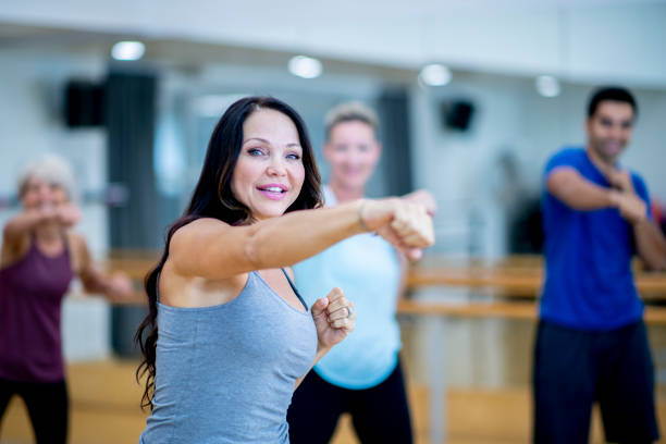 istock Punching Woman 1083956794