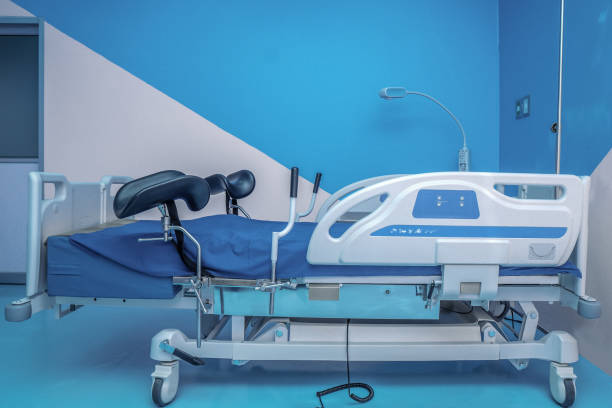istock empty modern labor and delivery bed in maternity ward 1083958212