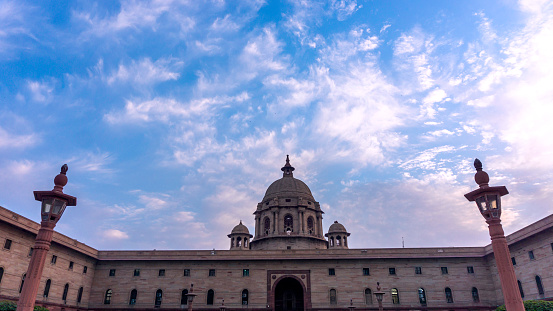 Rashtrapati Bhawan, or aka Presidential Residence, is divided in two blocks, North Block and South Block. South Block is being shot in this picture for it offered perfect backdrop of clouds with blue evening sky.