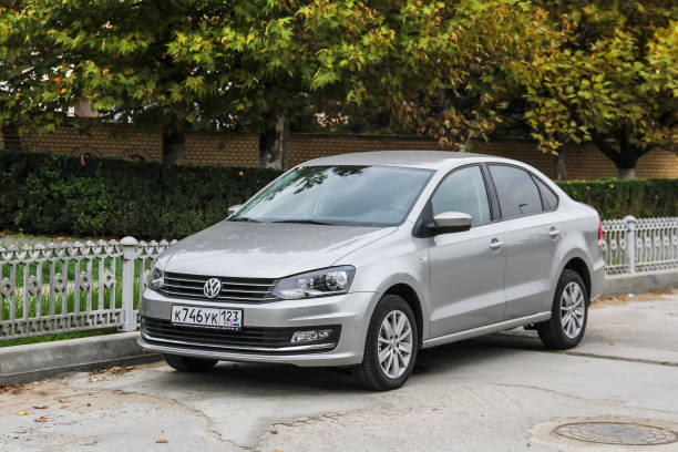 Volkswagen Polo Anapa, Russia - October 23, 2018: Motor car Volkswagen Polo in the city street. saloon car stock pictures, royalty-free photos & images