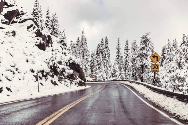 istock Wet Highway Snow Driving 1083976584