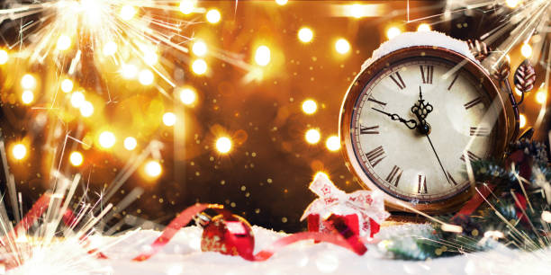 istock New Year, Christmas background. Christmas clock with snow. 1083978692
