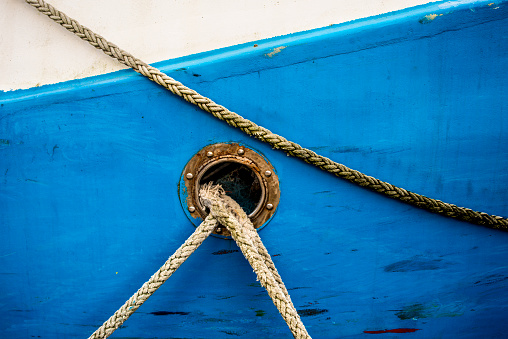 bulwark with mooring lines of a trawler