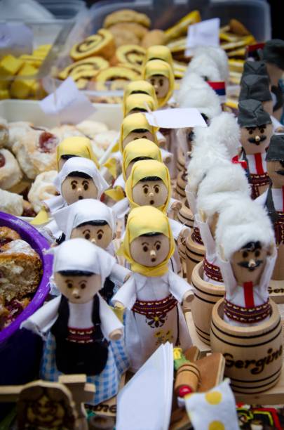 istock small wooden dolls dressed in traditional costume 1083994496