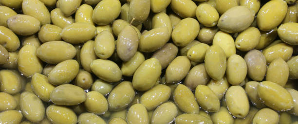 istock background of green olives 1083998204