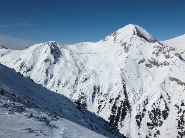 istock Winter view from Todorka peak, Pirin Mountain, Bulgaria 1083998680