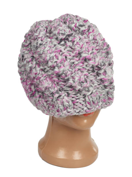 istock women`s knitted hat on a white background 1084017346