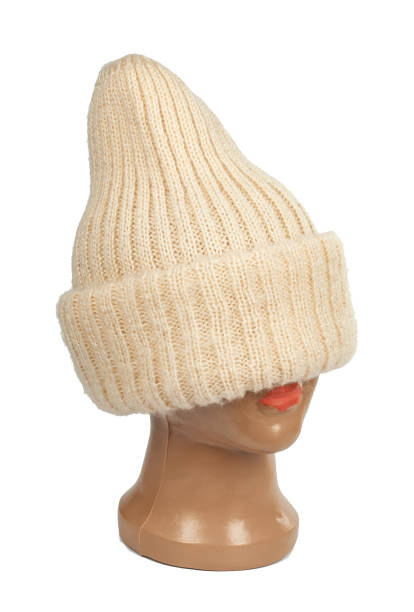 istock women`s knitted hat on a white background 1084017380