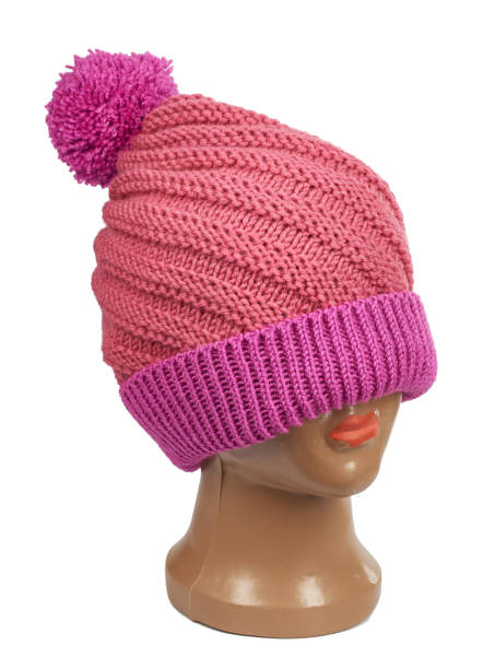 istock women`s knitted hat on a white background 1084017382
