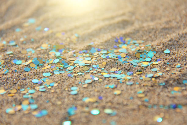 istock Green, blue or turquoise Soft Blurred Boke Background. Spangles and Shiny Silver Color Background. Bright Background. Glamorous background for your design and decoration. Sparkles on the sand. Magic 1084020710