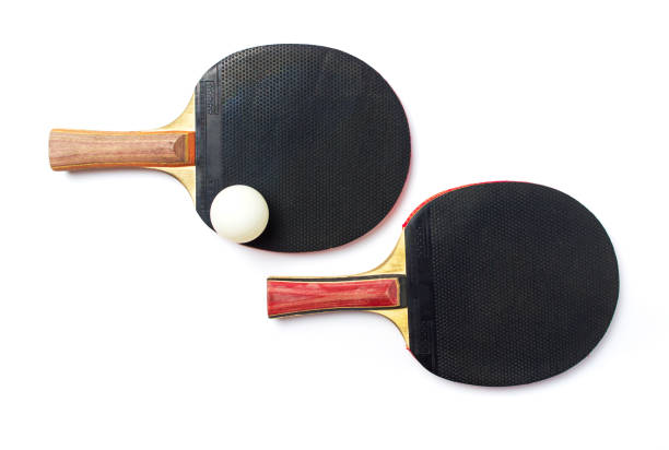 istock Two table tennis rackets and a ball isolated 1084026130