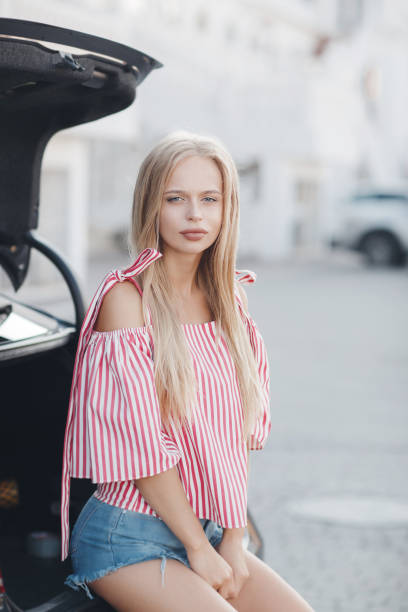 istock Cute young woman outdoors on a sunny day in summer 1084027346
