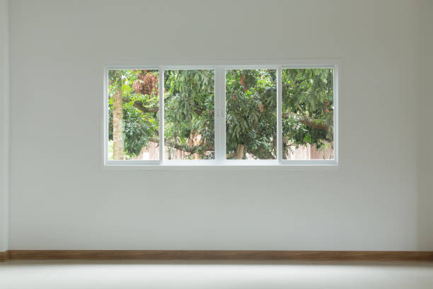 istock Empty room with glass window sliding on white wall and tile floor 1084032406