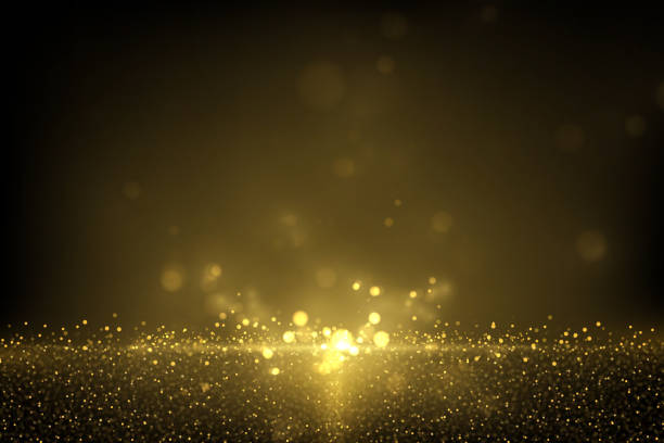 Sparkling golden particles on black Eps 10 shiny gold glitter dust abstract luxury background glitter textures stock illustrations