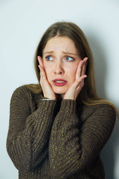 istock Young Woman Feeling Upset and Disturbed 1084034280
