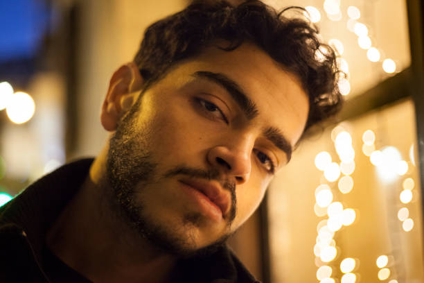 istock Seductive night portrait of a bearded young man. 1084038954