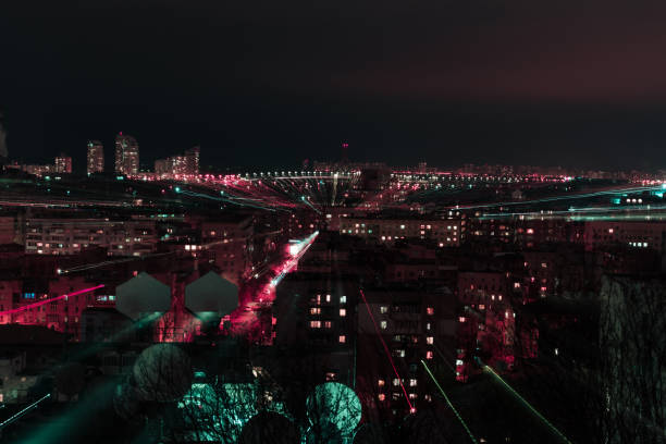 istock night cityscape with blurred bright bokeh lights 1084040504