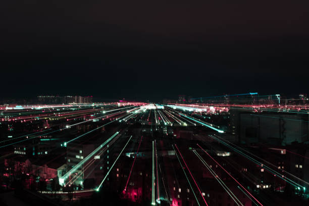 istock night cityscape with blurred colorful illumination 1084040556