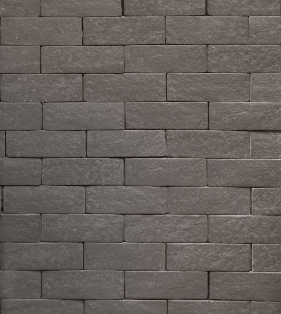 istock Brown brick wall pattern surface texture. Close-up of interior material for design decoration background 1084042708