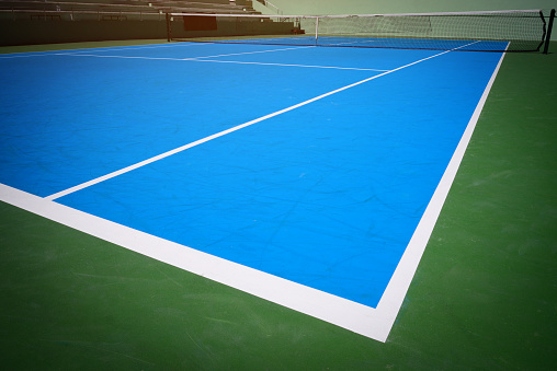 Tennis balls on the tennis court. Tennis ball out of tennis court. Tennis game.