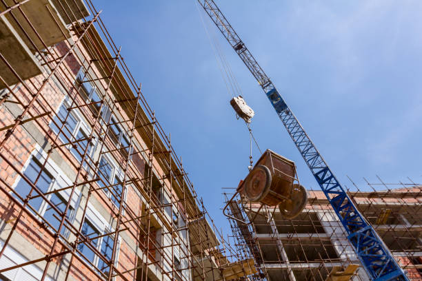 istock Crane is carry industrial tipping wheelbarrow 1084043732