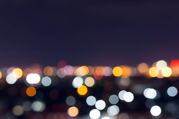 istock city night with dark sky, abstract blur bokeh light background 1084046872