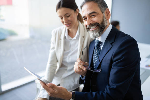 istock Collaboration and analysis by business people working in office 1084051362