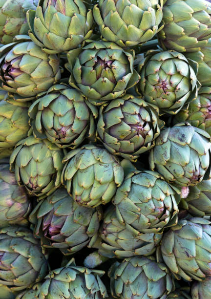istock Background of fresh artichokes 1084053650