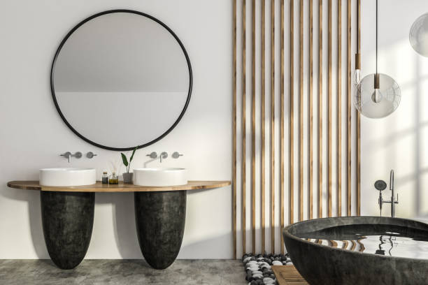 istock White bathroom interior, round tub and sink 1084060354