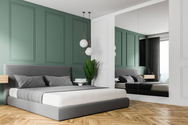 istock Green and white bederoom corner, mirror 1084060730