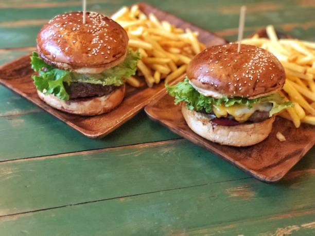 istock Hamburger and fries for two 1084066682