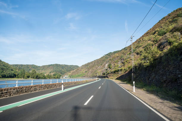 istock a road along the mountain 1084070342