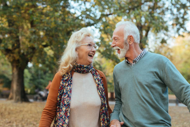 istock Senior couple taking a walk in the park 1084075304