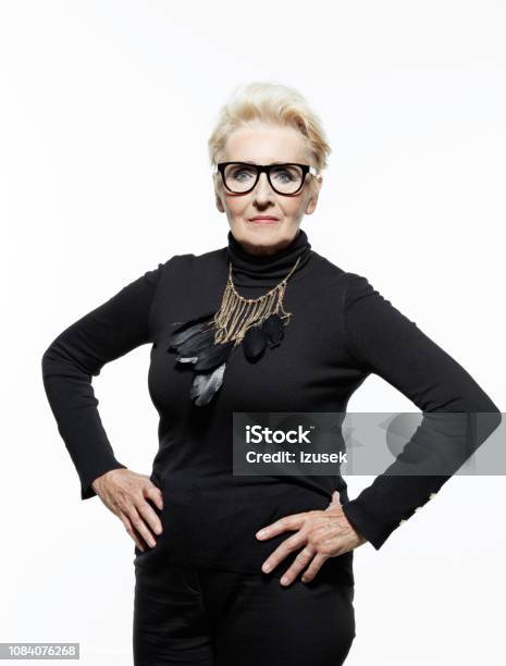 Portrait Of Bossy Senior Woman Stock Photo - Download Image Now - White Background, Displeased, Anger