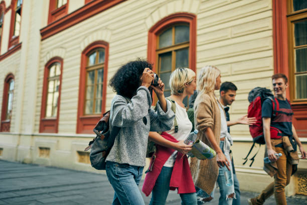 istock Millennial's Friends Visit Foreign City 1084076894