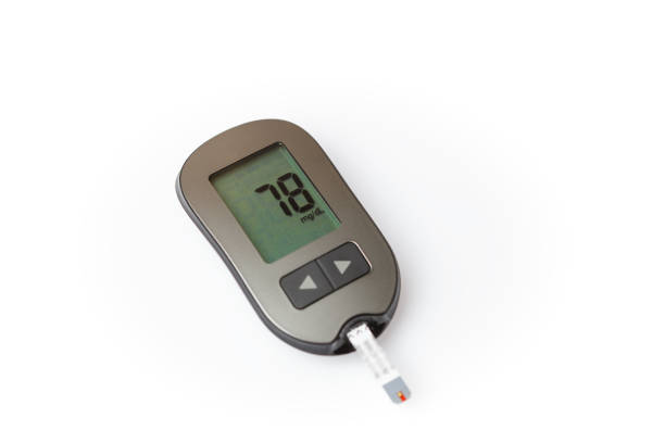 istock Danger of hypoglycemia, glucometer with low blood sugar isolated on white background 1084084140