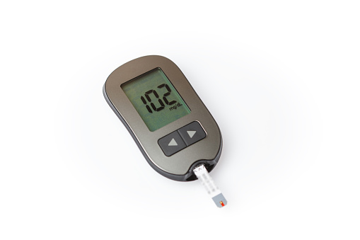 Glucometer with good blood sugar result isolated on white background