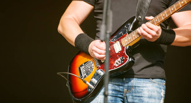 istock guitarist at a rock concert 1084087008