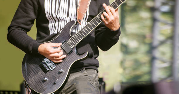 istock guitarist at a rock concert 1084087034