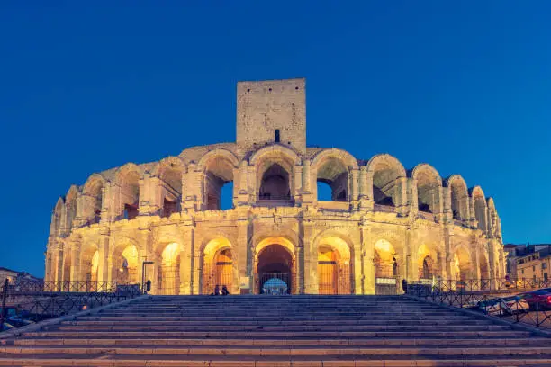 The roman Arles amphitheatre founded in 90 AD in Provence, France. The amphitheatre is a popular tourist destination in the city of Arles and a UNESCO world heritage site.