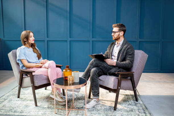 istock Woman with psychologist in the office 1084100622