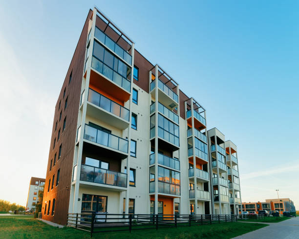 istock Apartment home and house residential building complex with gate 1084101376
